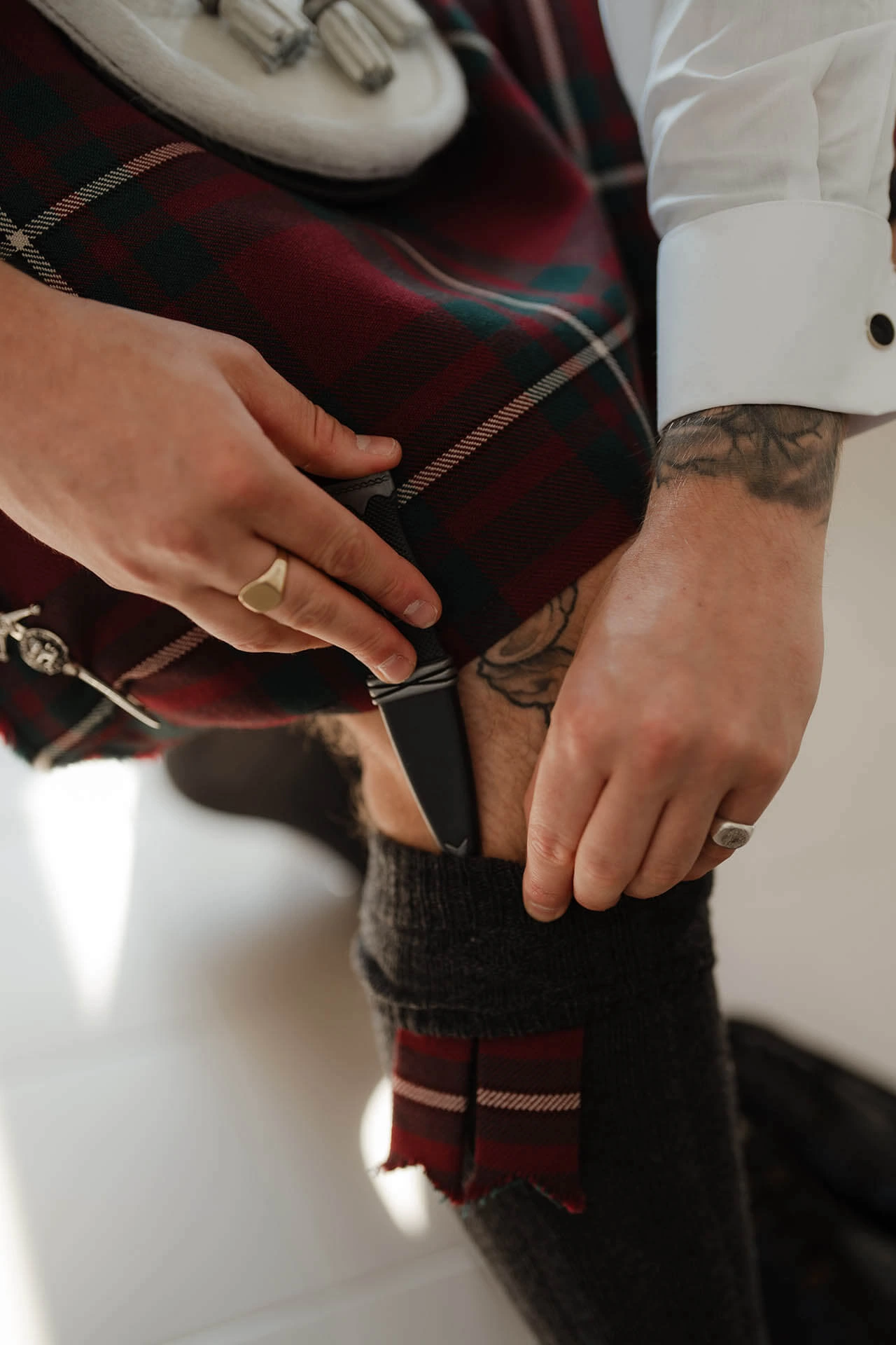 Multicultural Wedding in Santorini - scottish preperation for groom - Marvellous Wedding
