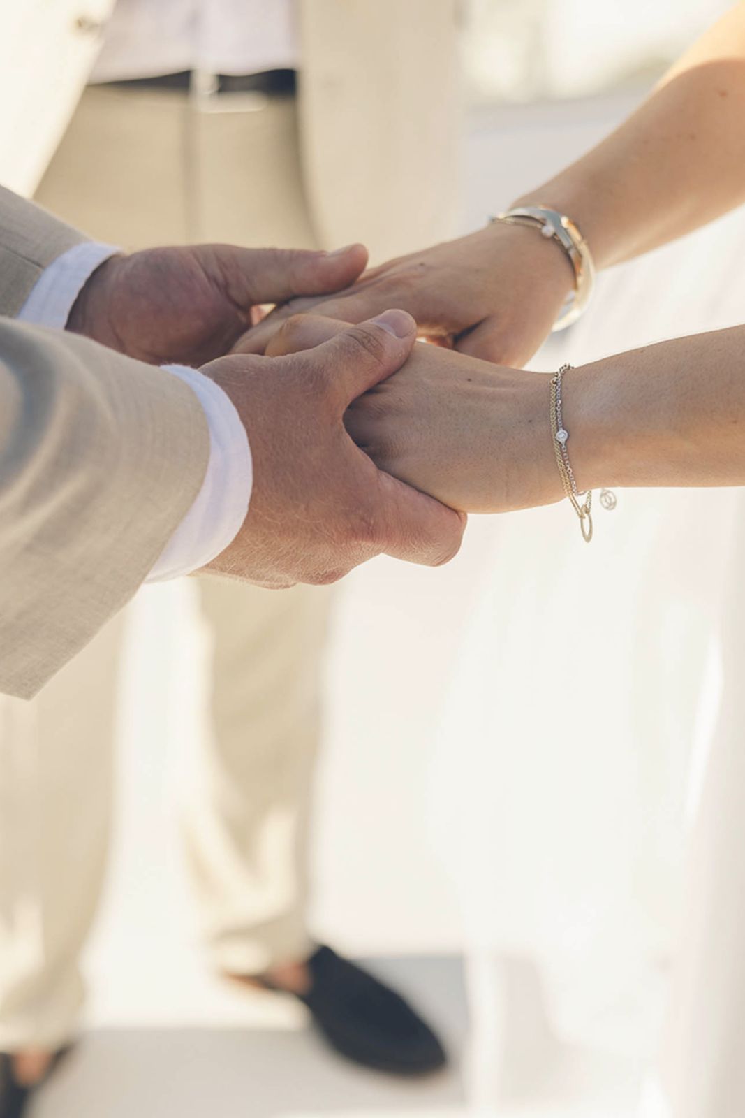 Legal Documents for a Santorini Wedding - holding hands - Marvellous wedding